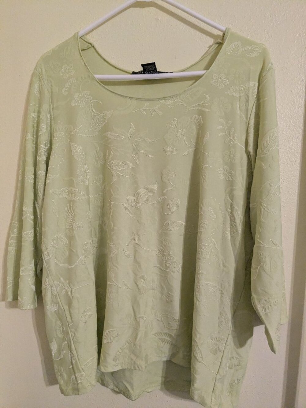 Light lime green shirt.
